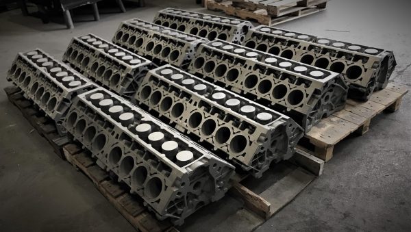 several Sixteen Power M16 V16 engine blocks