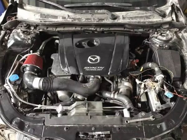 2016 Mazda 6 with a 3UZ V8 and RWD drivetrain