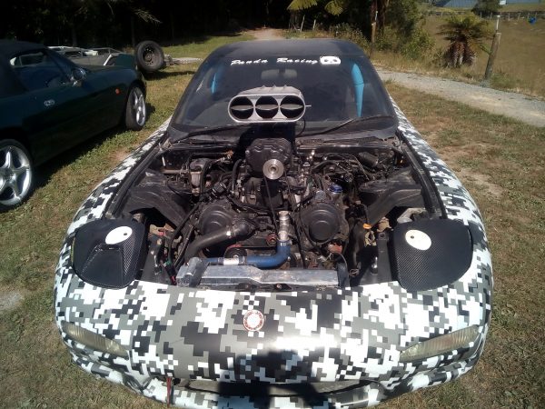 Mazda RX-7 with a supercharged 3UZ-FE V8