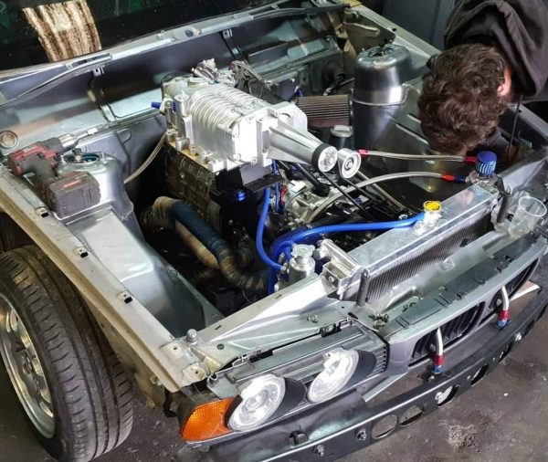 BMW E34 with a supercharged 13B two-rotor