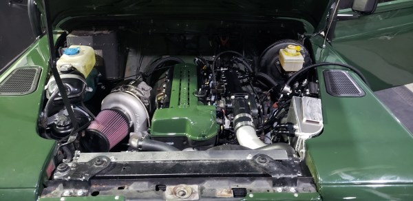 Land Rover Defender with a Toyota 2JZ-GTE inline-six swapped by Rich Auto Works