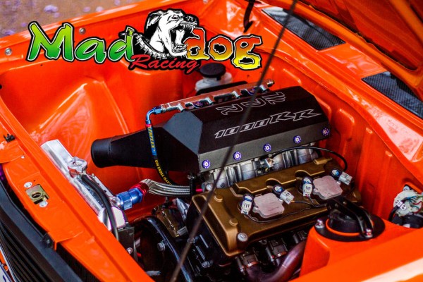 Nissan 1400 truck built by Mad Dog Racing with a 1.0 L Honda CBR1000RR inline-four