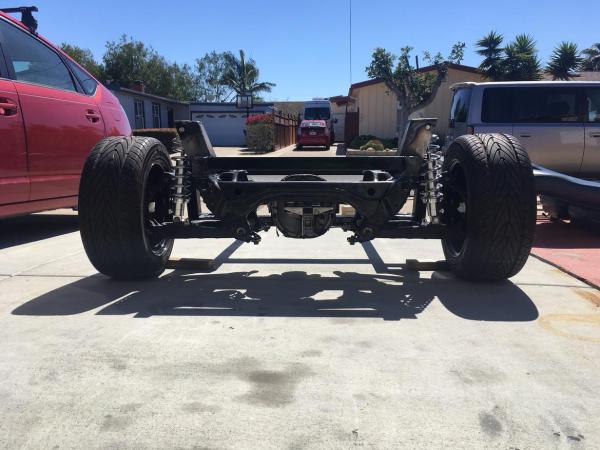 custom tubular chassis with a Miata rear subframe and 8.8-inch rear end